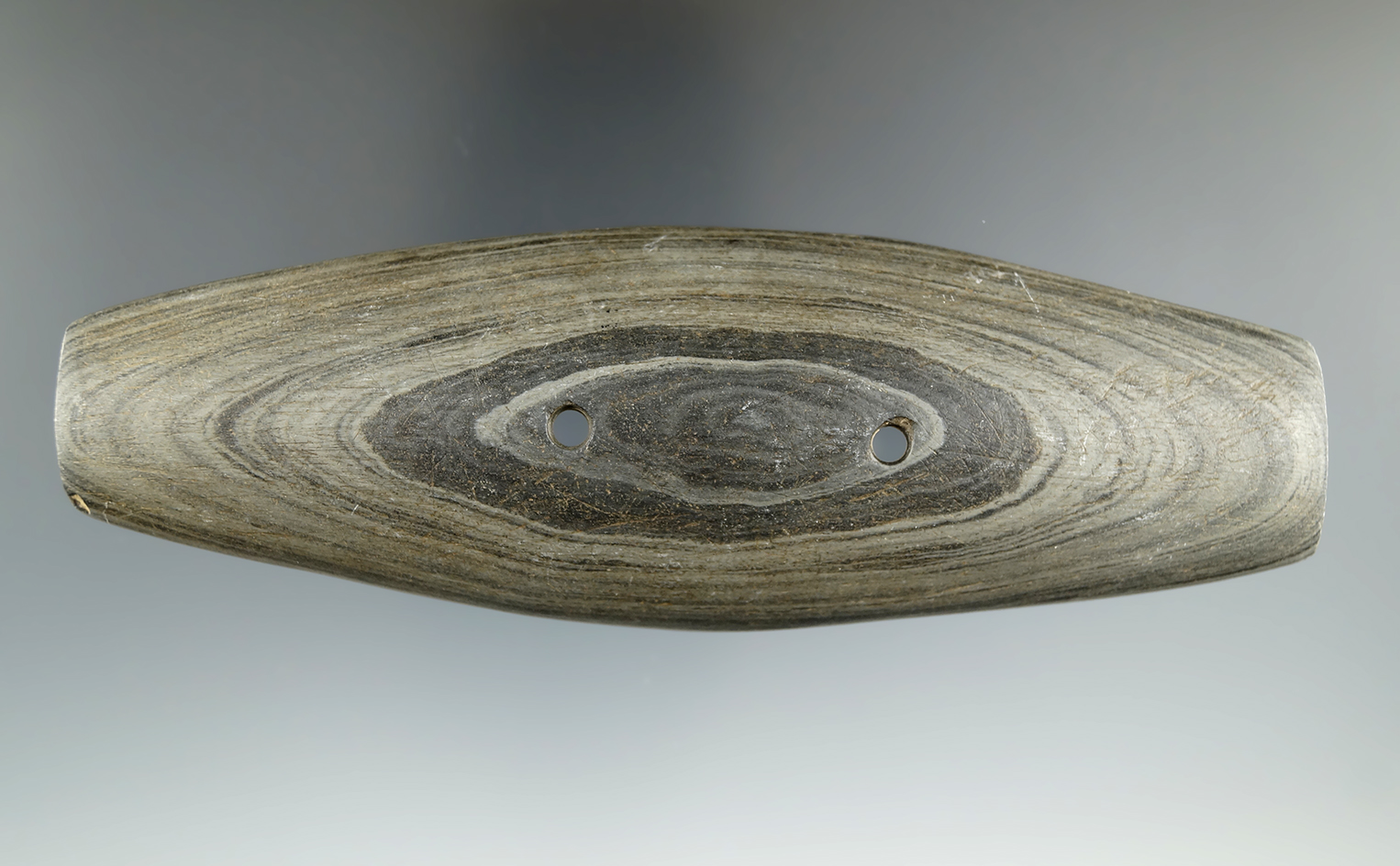 5 7/16" Hopewell Gorget made from Banded Slate found in Noble Co., Indiana. Ex. Smith, Stiemlie.