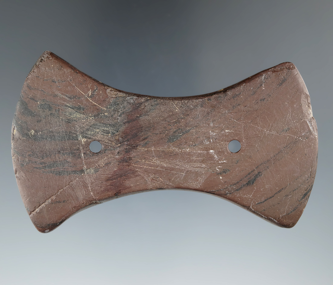 3 1/2" Adena Bi-Concave Gorget that is broken in the middle and has been professionally reattached.