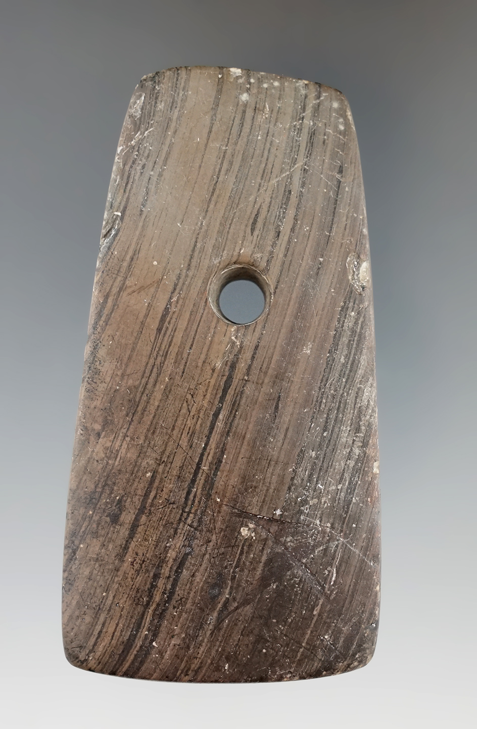 3 11/16" brown and black banded slate Trapezoidal Pendant found in Randolph Co., Indiana.