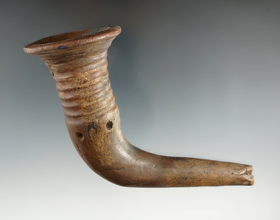 5" long Iroquois clay ringed bowl trumpet pipe with a heavily restored bowl area and elbow - NY.