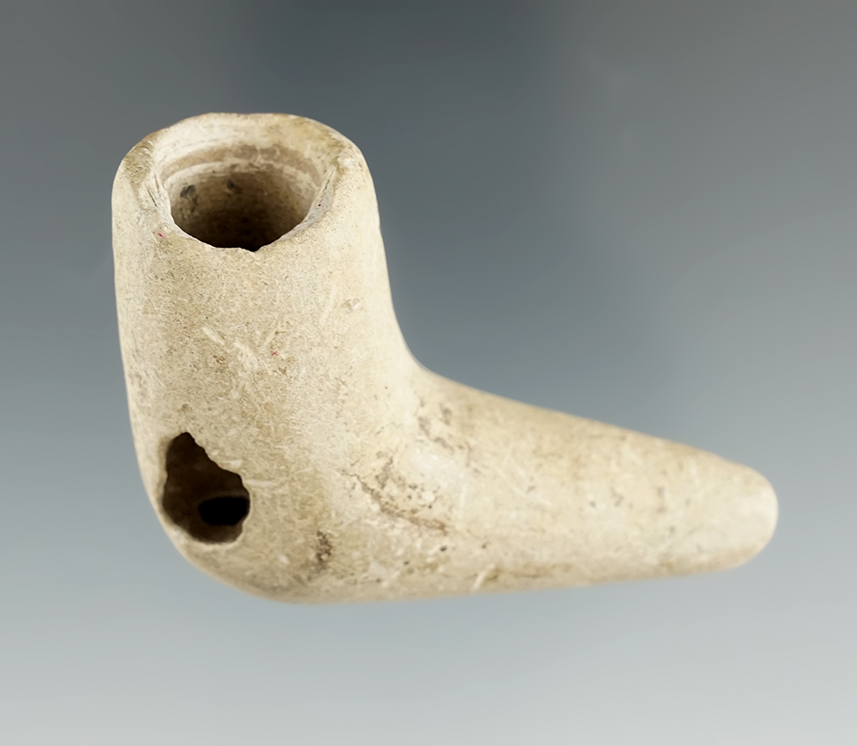 2 1/4" late Woodland stone pipe some damage to the bowl and rim (can be seen in the photos). NY