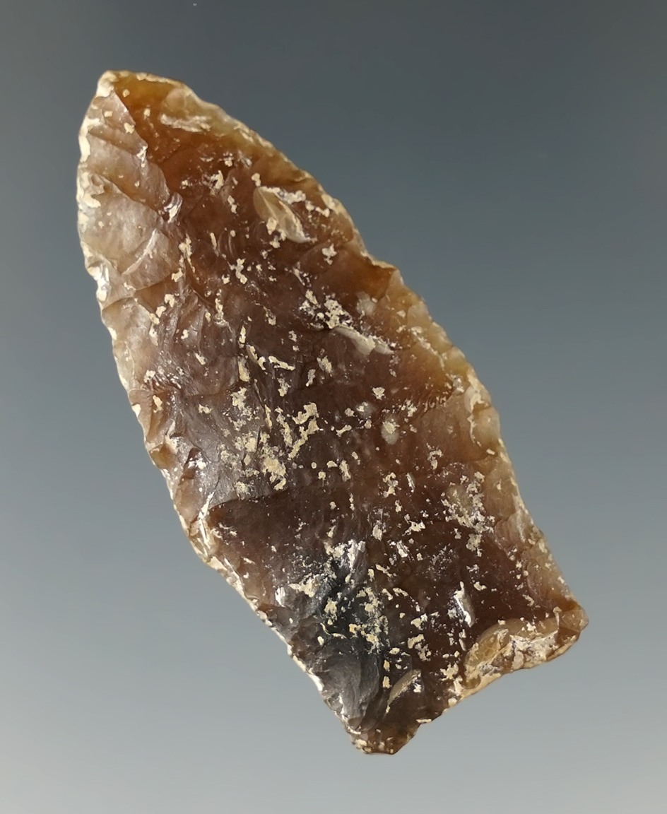 1 7/8" thin and well flaked Scottsbluff made from Knife River Flint found in Eastern South Dakota.