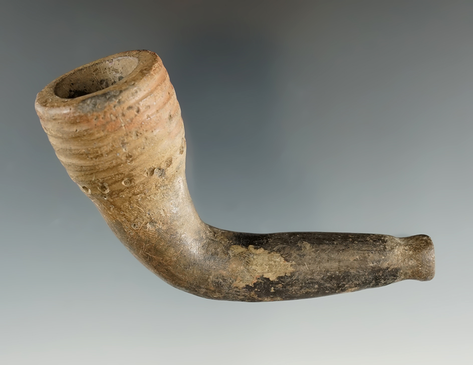 3 1/2" Iroquois ring bowl pipe with a broken and mended elbow & partial restoration to the bowl.