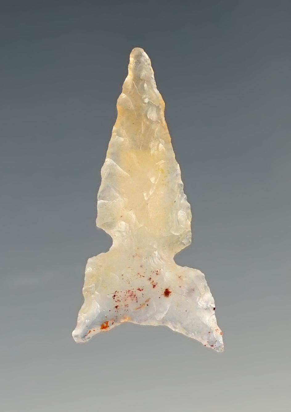 Nice! 1 3/8" beautifully translucent red speckled agate Sidenotch arrow point. New Mexico.