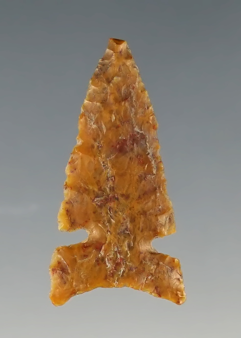 2 1/4" thin and well flaked Sidenotch arrow point found in New Mexico.
