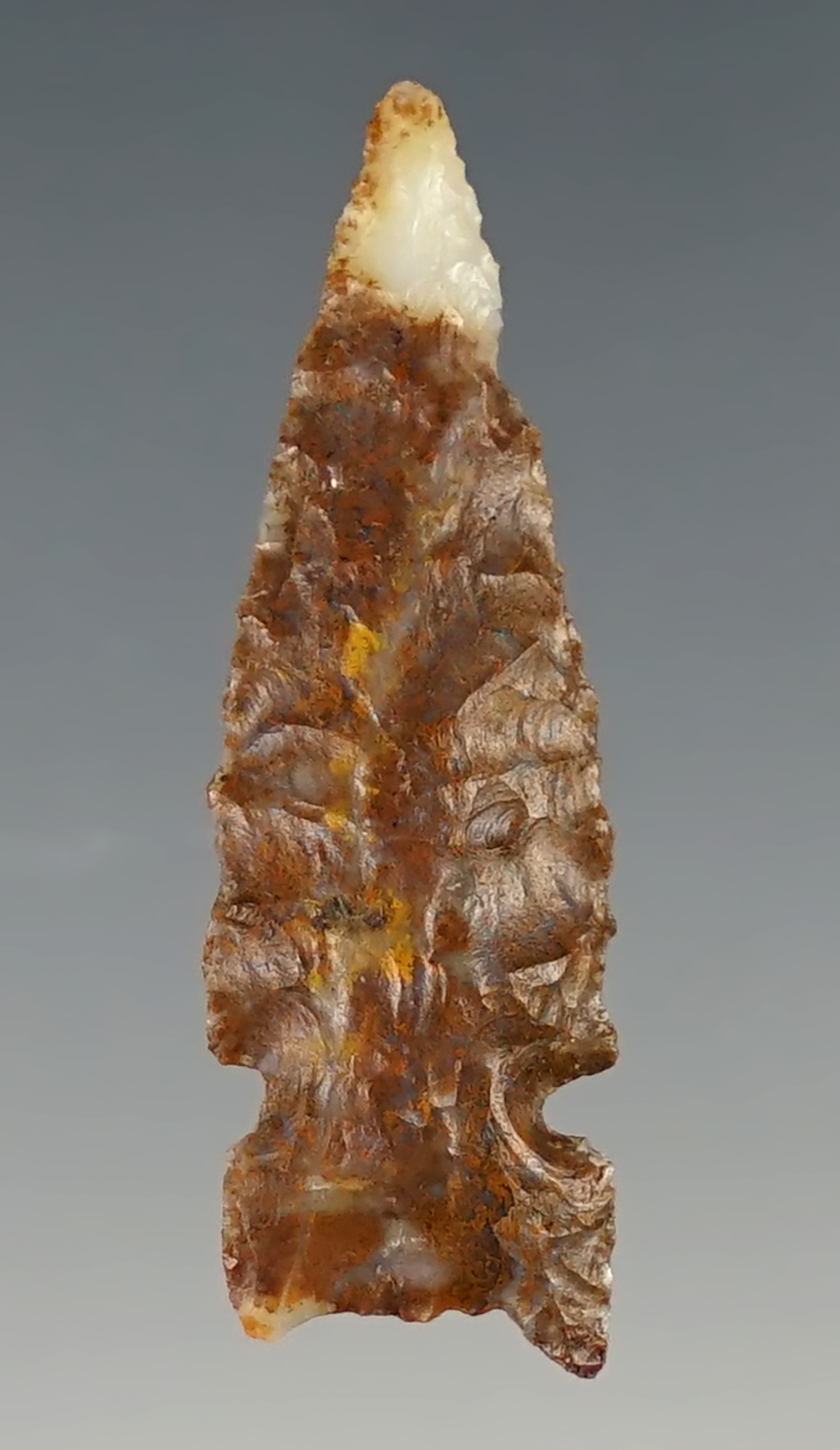 1 5/8" Sidenotch arrow point made from attractive Multi-color material. Found in New Mexico.