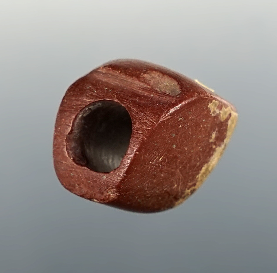 7/8" Anciently drilled stone artifact found in New Mexico.