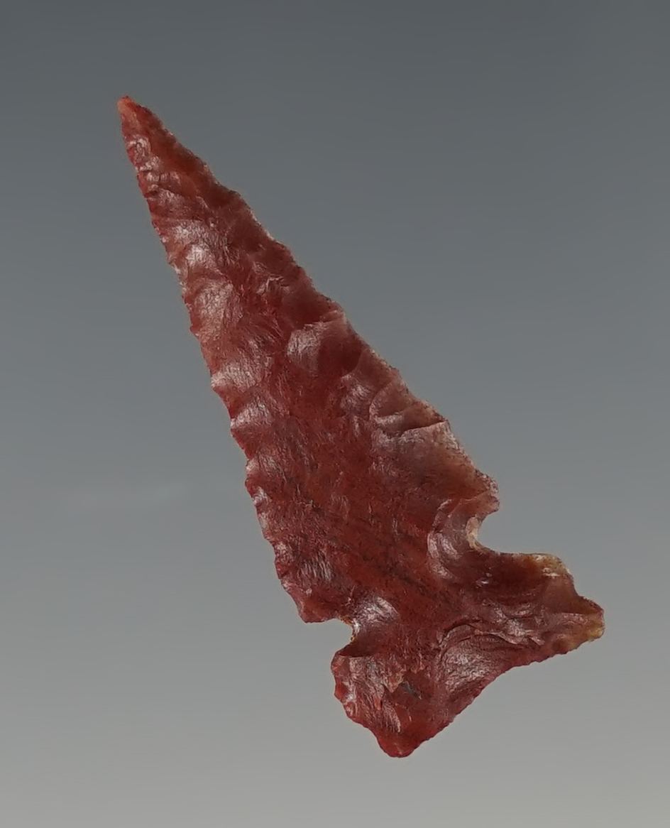 Well styled 1 1/2" Sidenotch point found in New Mexico made from beautiful red material.