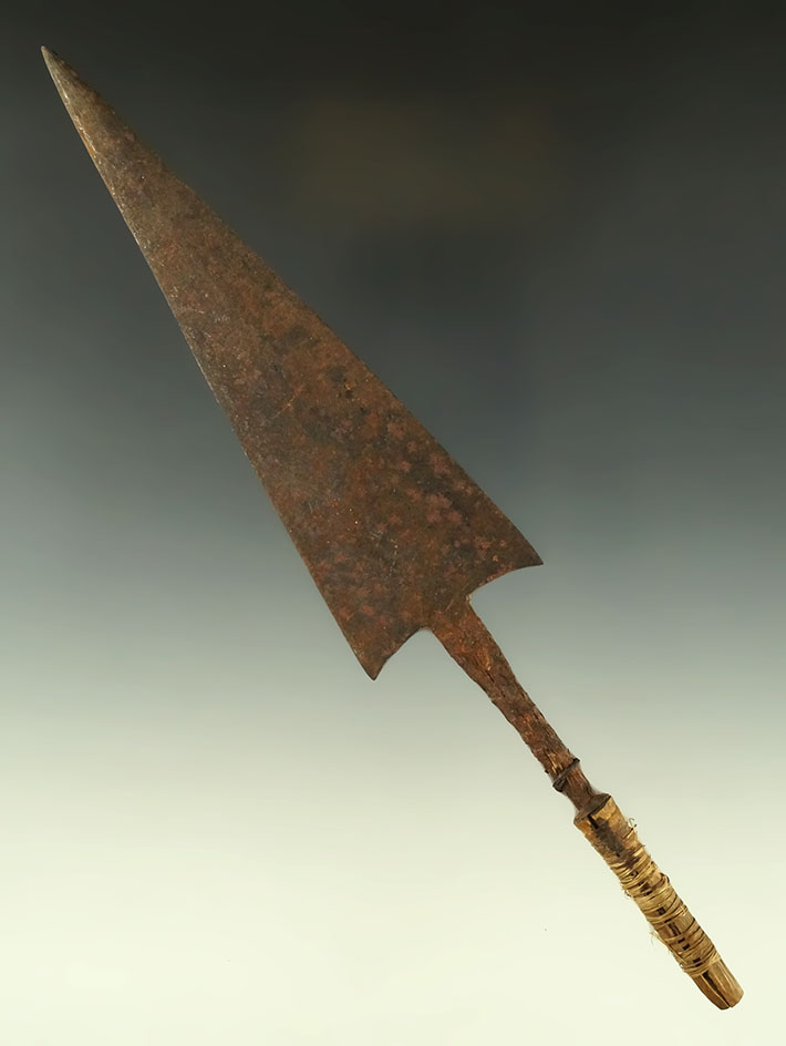 Large 8" metal trade spear that is blacksmith-made with a sinew wrapped base. Circa 1800's.