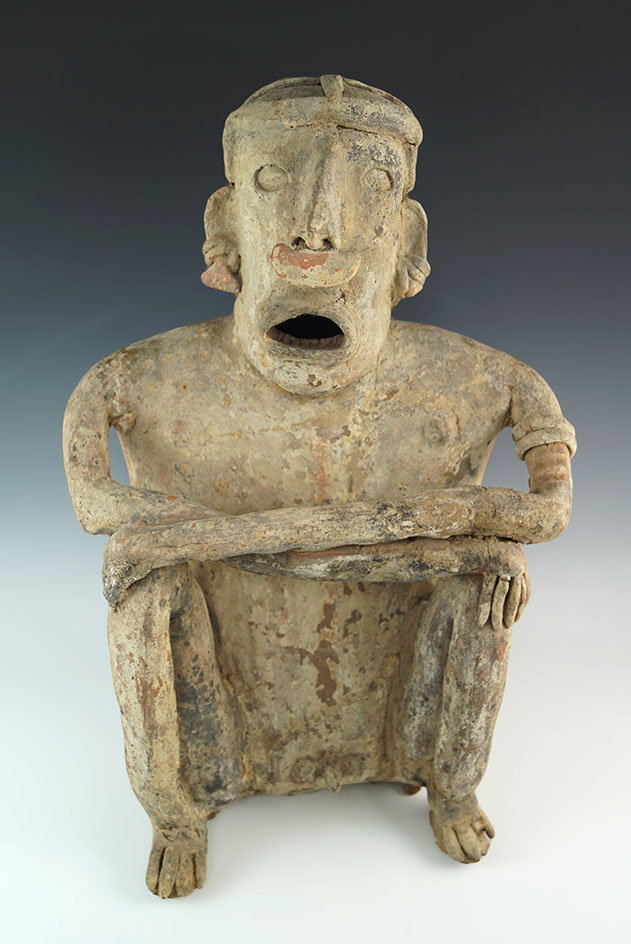 Large 16" tall Colima pottery figure featuring a seated man with crossed arms. west Mexico.