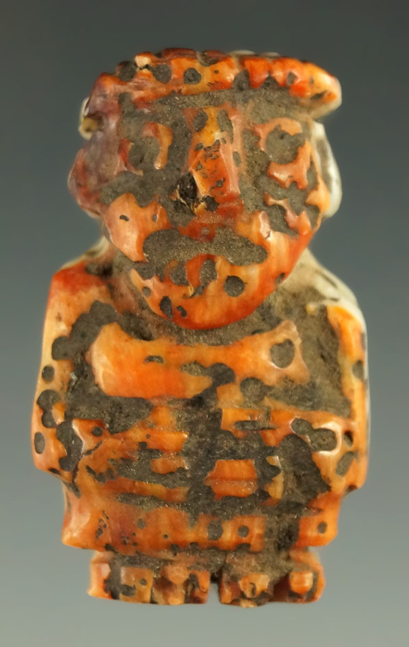 Very unique Spondylus shell human carving which is red/cream-colored  coastal area of Peru.