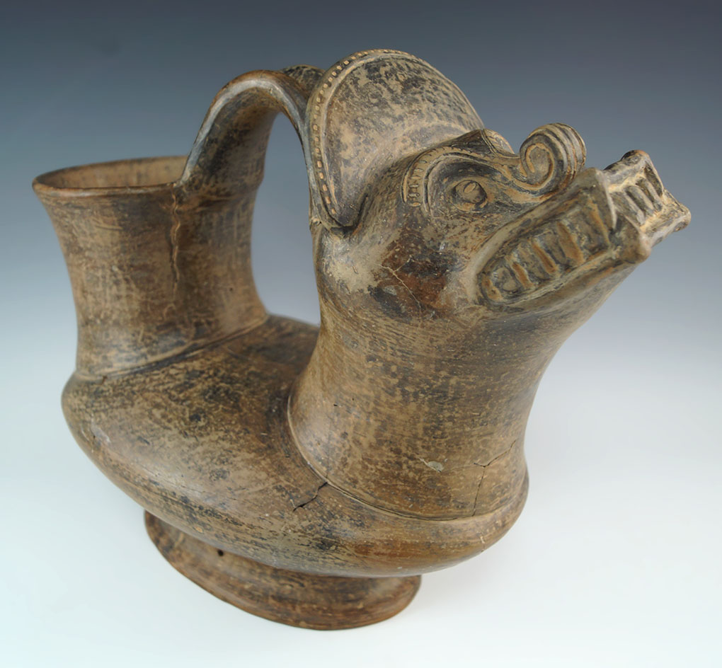 Simply incredible! 11 1/2" x 9 1/2" tall strap handle pottery vessel Tairona culture, Columbia.