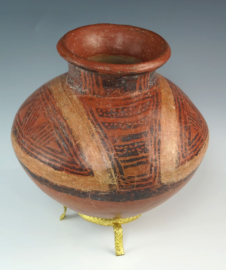 Olla with a conical bottom which is solid - measures 6" by 6". Found in Panama.