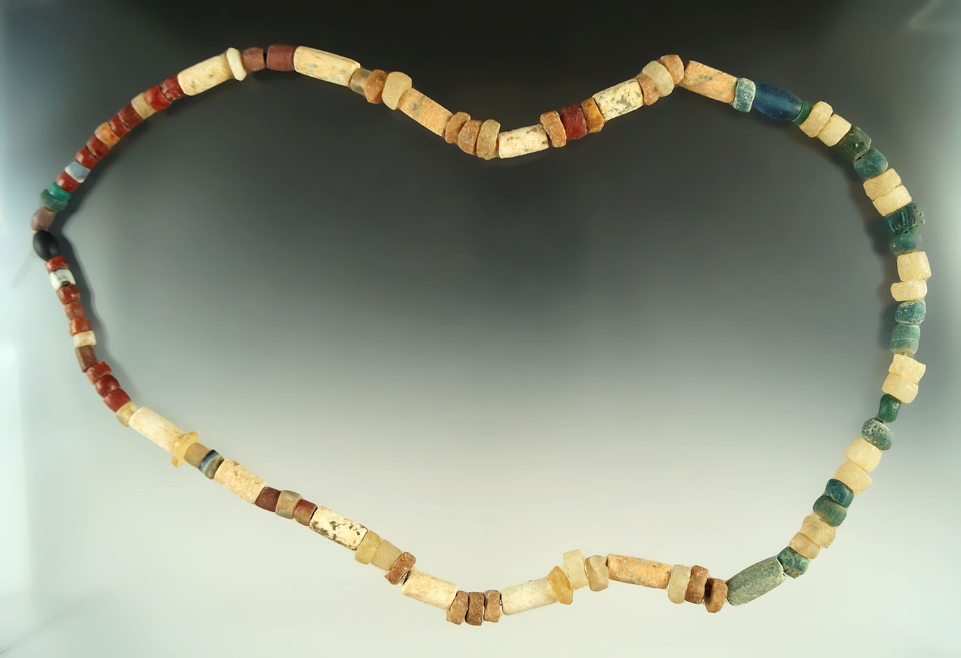 Nicely restrung 24" necklace Quartz, Limestone, Jet and Gneiss found in the Cajamarca area, Peru.