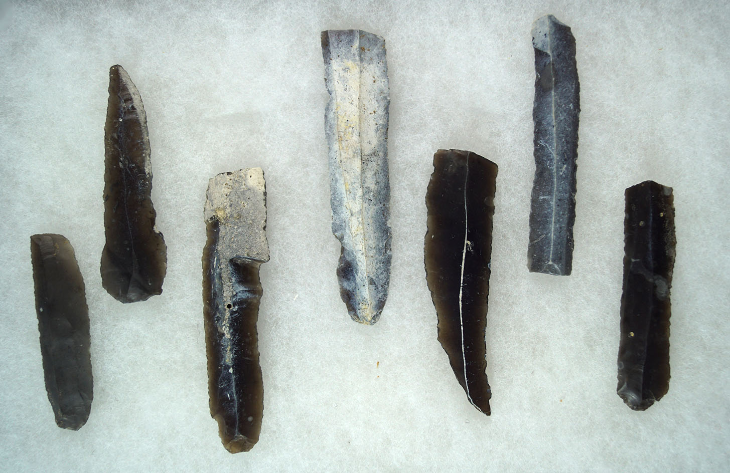 Set of 7 heavily patinated Uniface Flake Knives struck off a core.Copenhagen, Denmark.