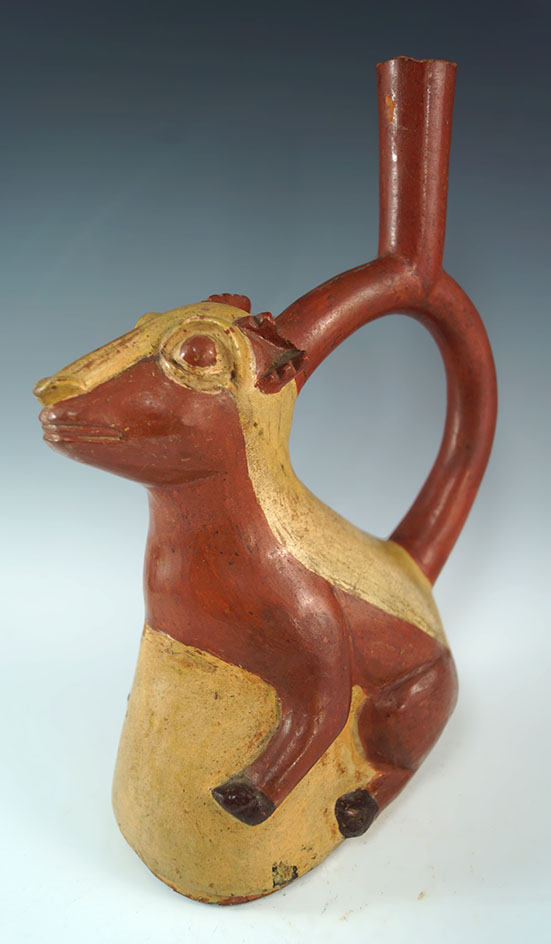 9 1/4" tall llama effigy Moche stirrup bottle painted red/buff. Handle is broken and glued. Peru.