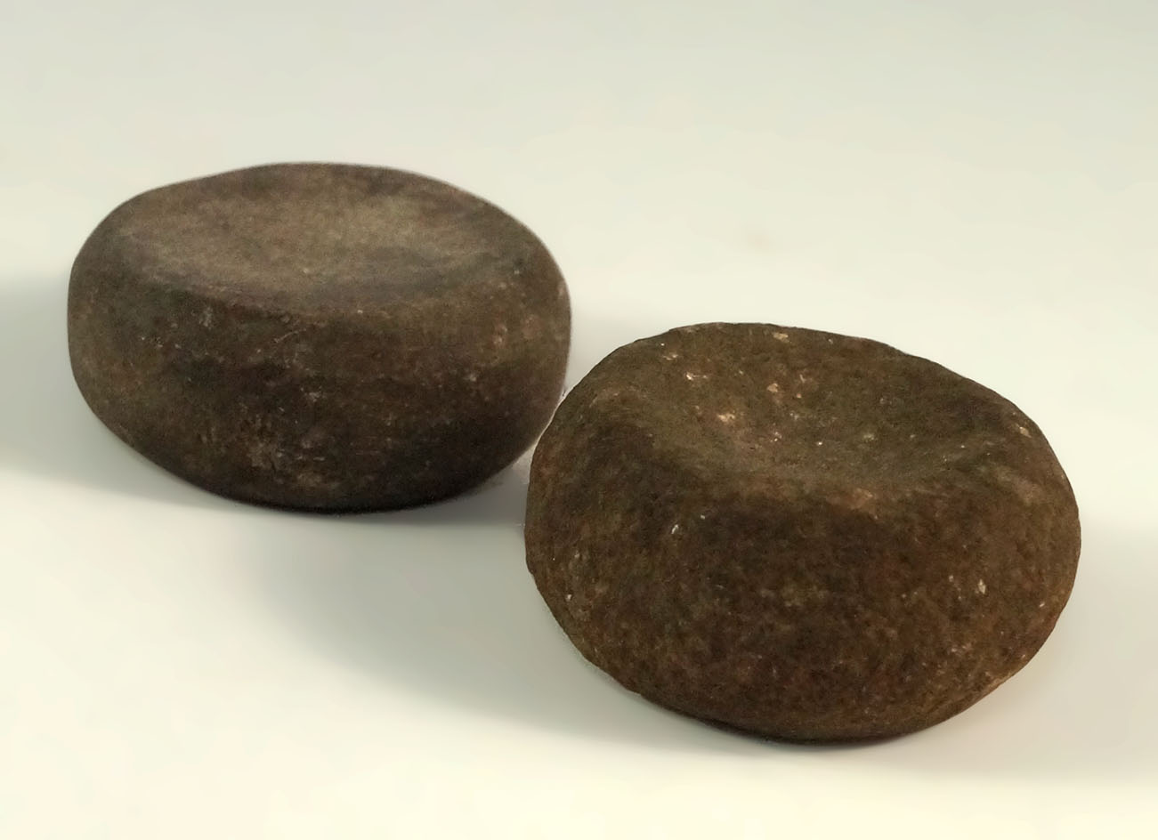 Pair of nicely double cupped Miniature Discoidals/GamingStones, largest is 1 5/8" diameter. .