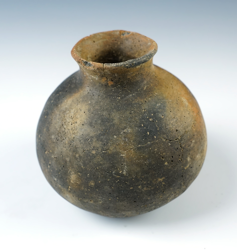 3 5/8" ancient pottery Olla in solid condition. Recovered in Clark Co., Arkansas. Bennett COA.