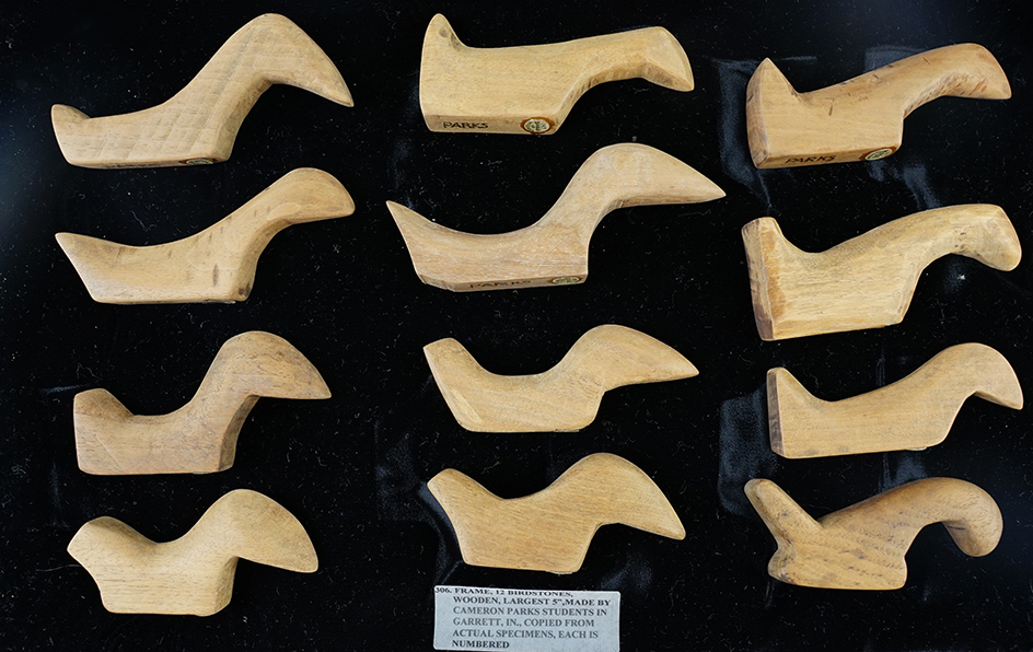 Set of 12 wooden Birdstones carved by Cameron Parks' students in Garrett, Indiana. 