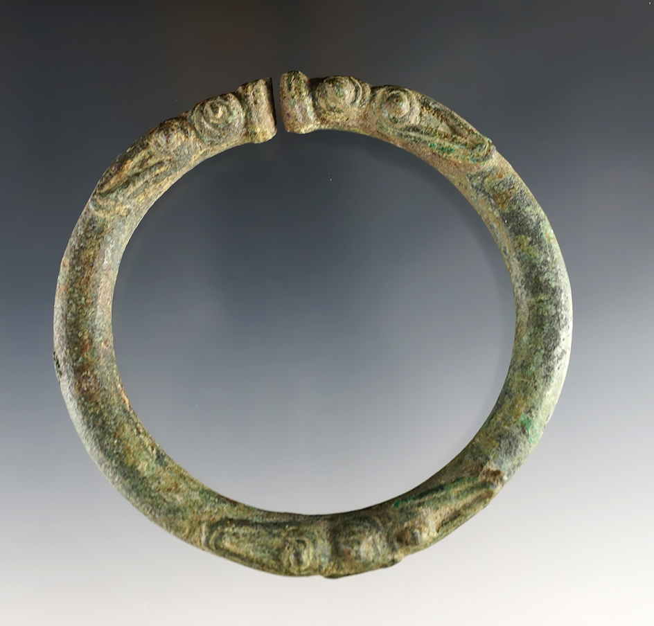 Nicely decorated 4" diameter Neolithic Bracelet made from heavily patinated bronze. Burma. 