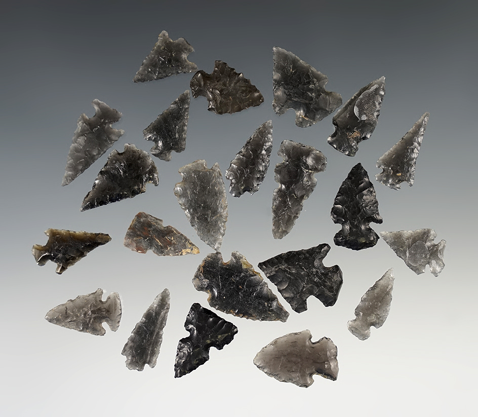 Group of 25 Assorted Arrowheads made mostly from Obsidian. New Mexico. Largest is 1 3/16"