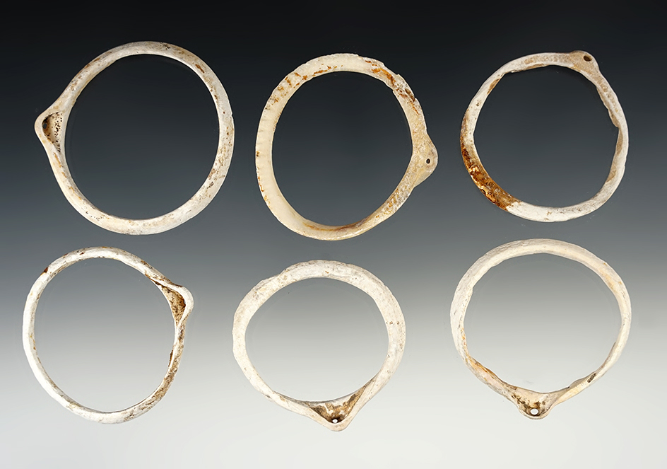 Set of 6 very old nicely cut shell ornaments recovered in New Mexico. Largest is 2 3/8" wide.