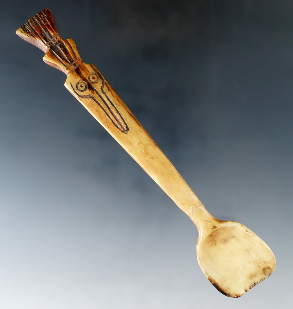 6" beautifully carved ornate bird effigy bone spoon which has been broken and glued.