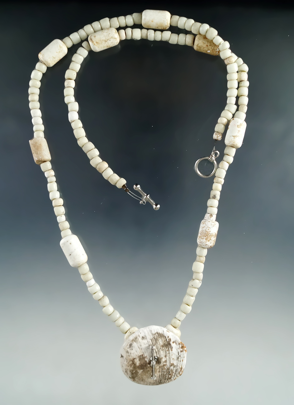 25" Strand of early glass, bone and shell trade beads.