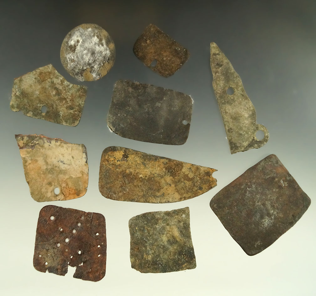 Unique group of drilled copper and metal pendant found at the site near the Columbia River.