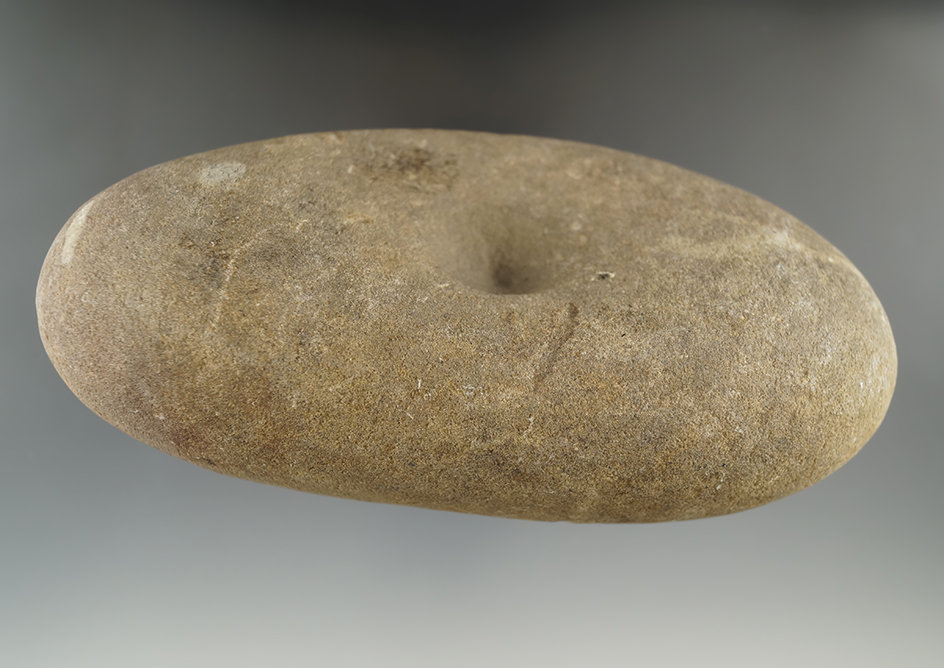 6 1/8" nicely scooped and divoted nutting stone made from sandstone found in White Co., IL.