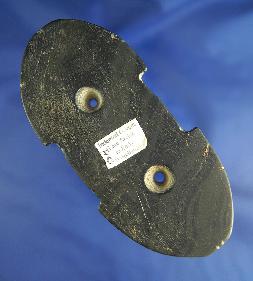 Very rare style 4 1/4" Indented Adena Gorget made from beautifully banded slate found in Ohio.