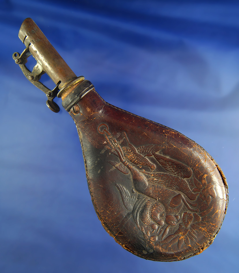 Old shot pouch made from embossed leather.