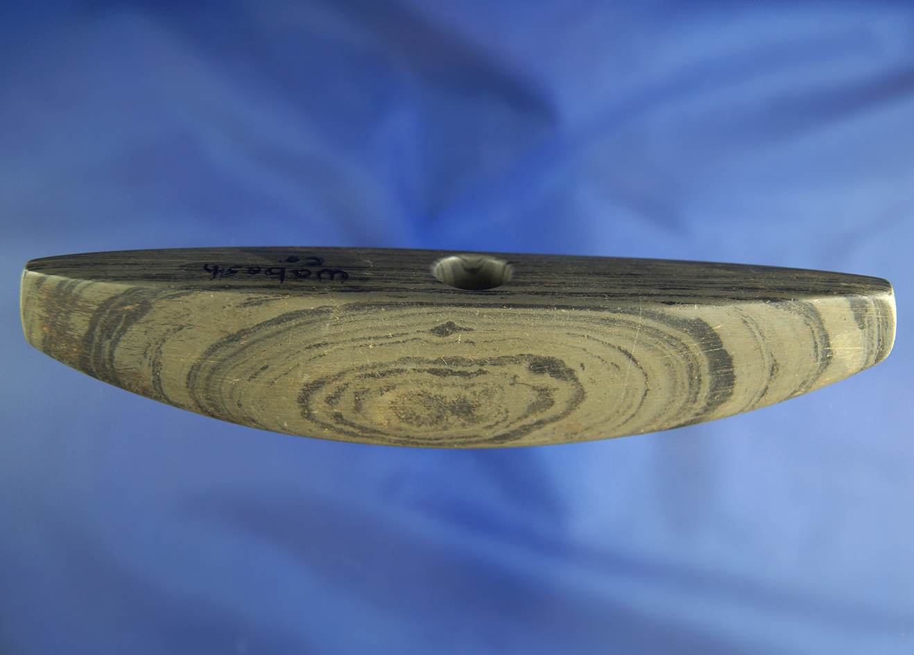 Nicely styled and heavily patinated 5 13/16" Bannerstone found in Wabash Co.,  Indiana.