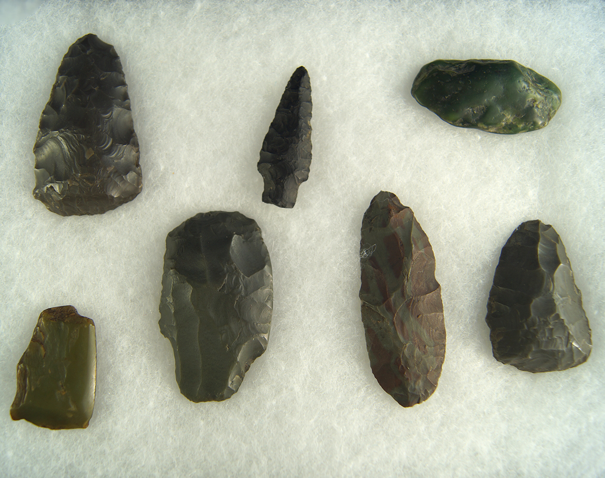 Set of seven assorted Inuit projectiles, knives and scrapers found in Alaska. Largest is 2 1/4".