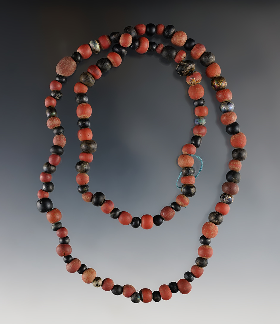 22" strand of black and red ground beads found at the White Springs Site, Geneva New York.