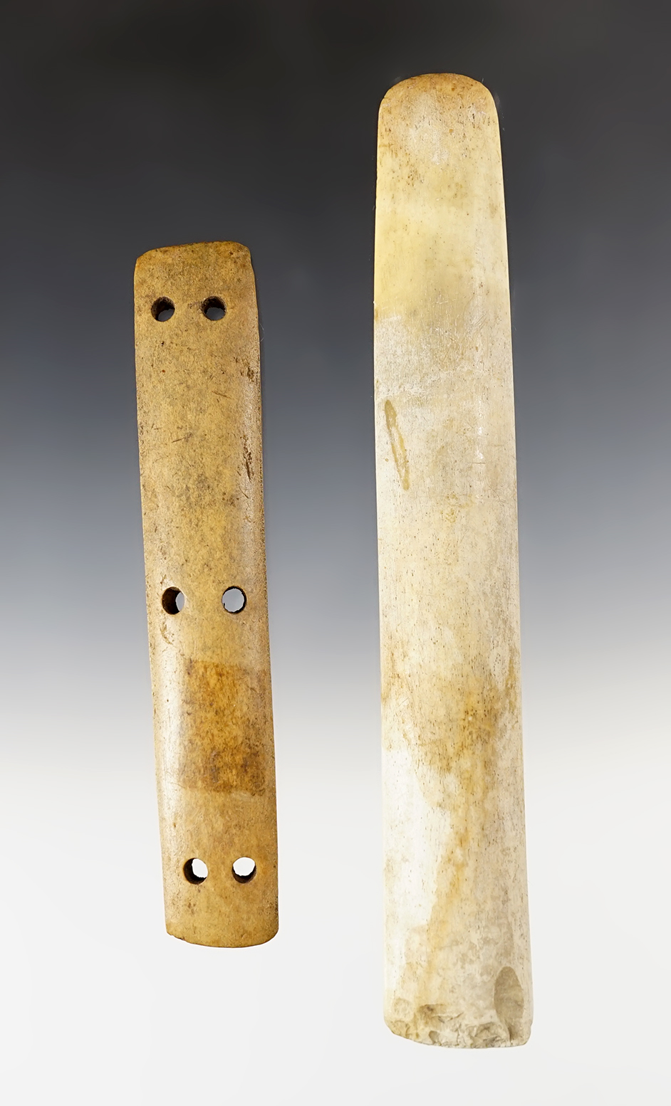 Pair of Inuit bone artifacts from Alaska. Includes 8 1/4" chisel/scraper and section of bone armor.