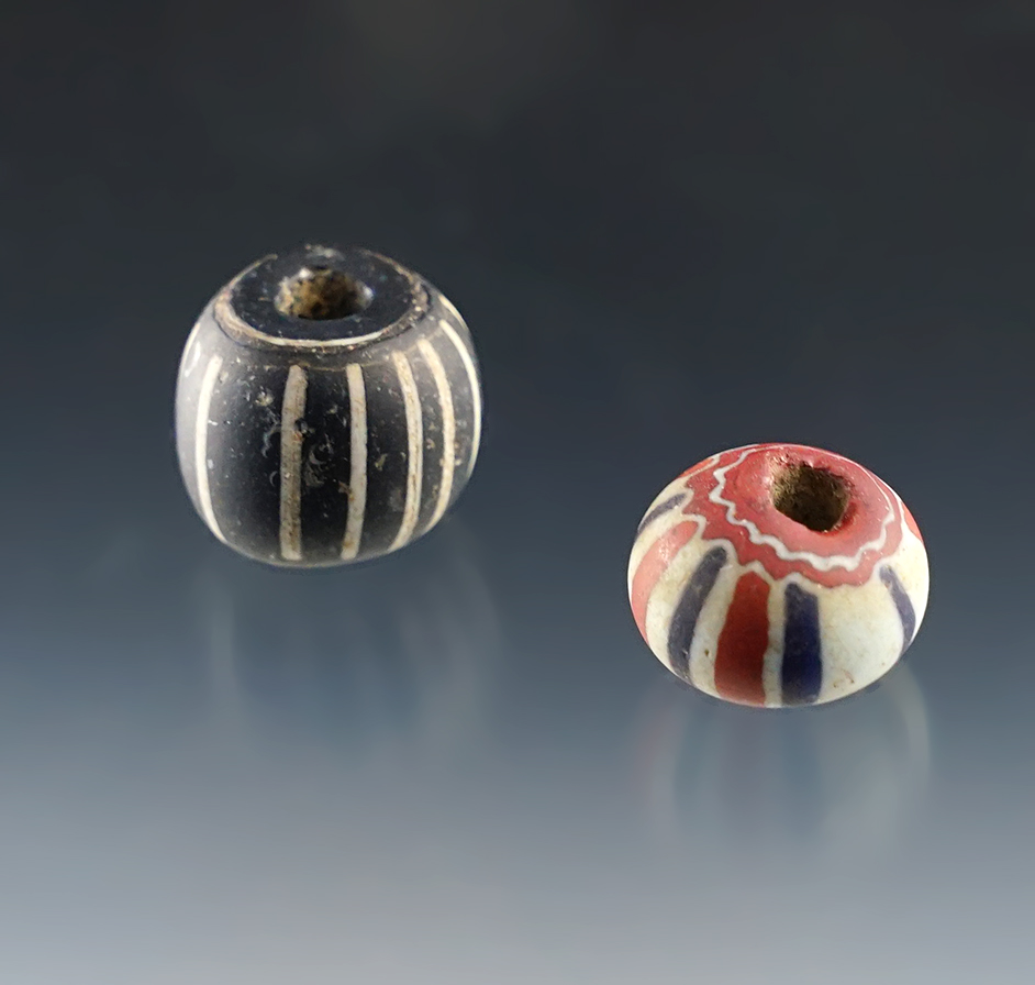 Two large and polychrome beads found at the Powerhouse Site, Lima, New York. 