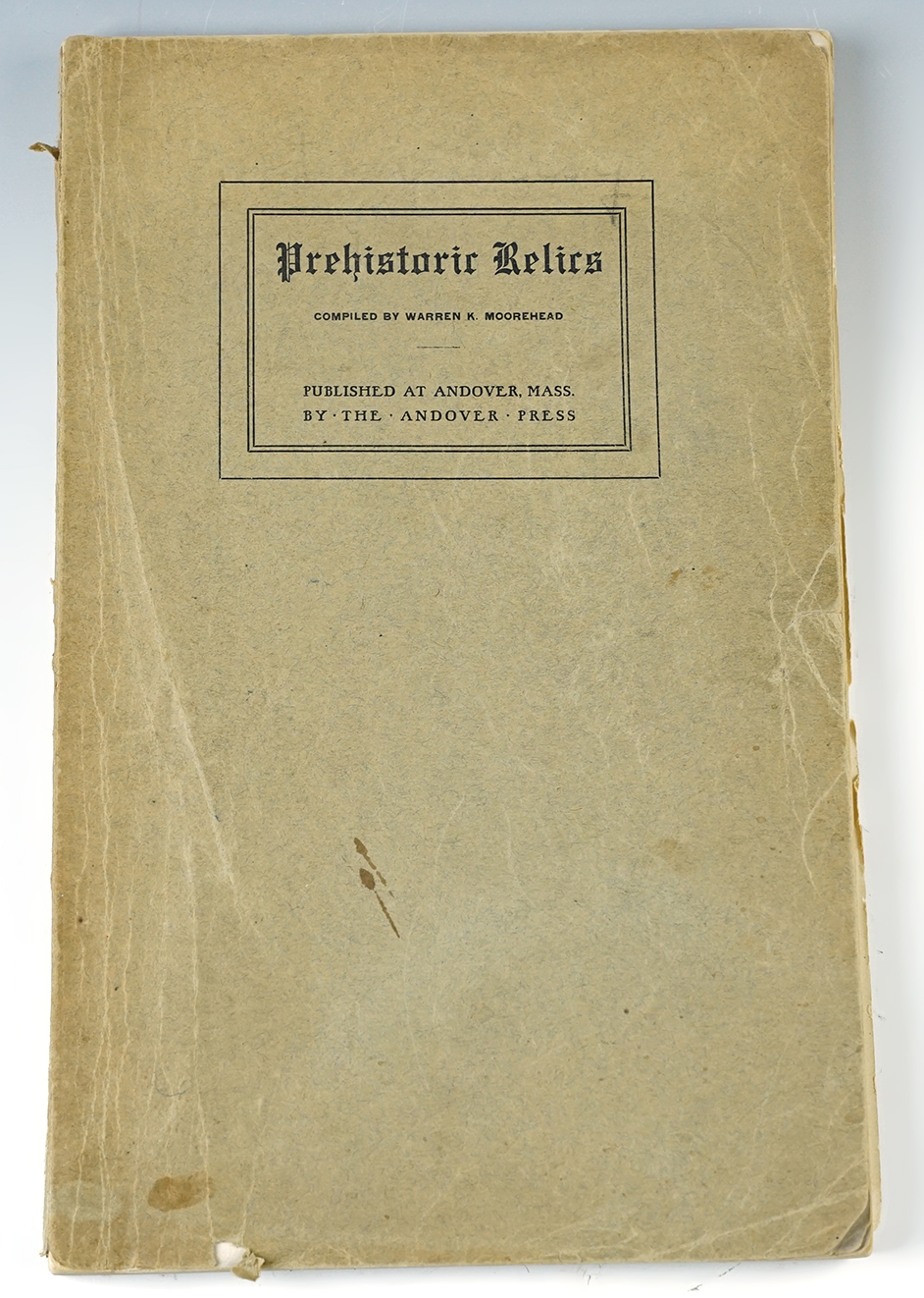 Softcover Book: "Prehistoric Relics" by Warren K. Moorehead. Cover is rough, few pages loose. 