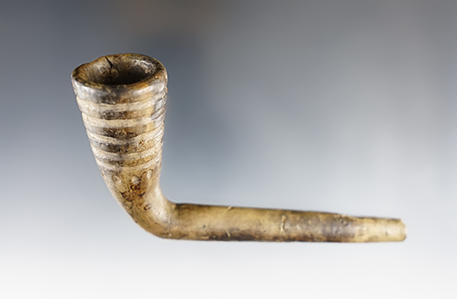 4 1/2" long Ring Bowl Pipe. Stem is broken and mended with partial restoration. New York.