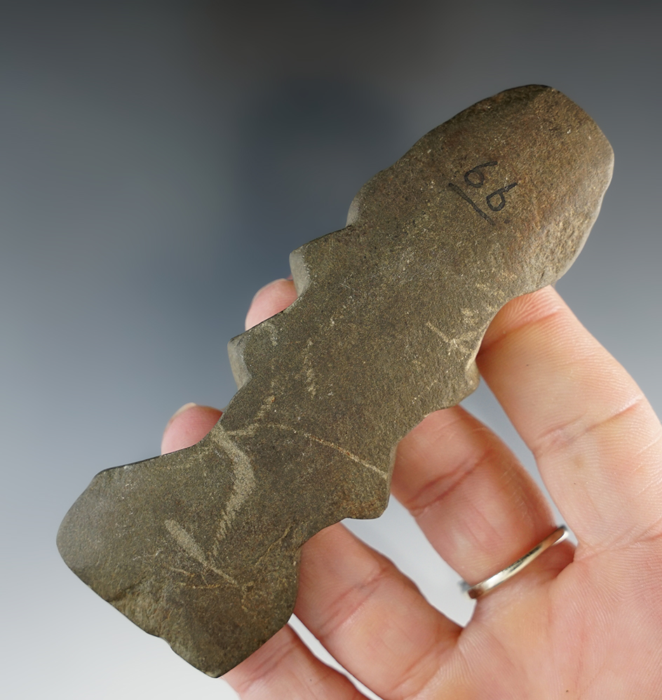 Rare and unique 4 1/16" Slate Eccentric that is well patinated.