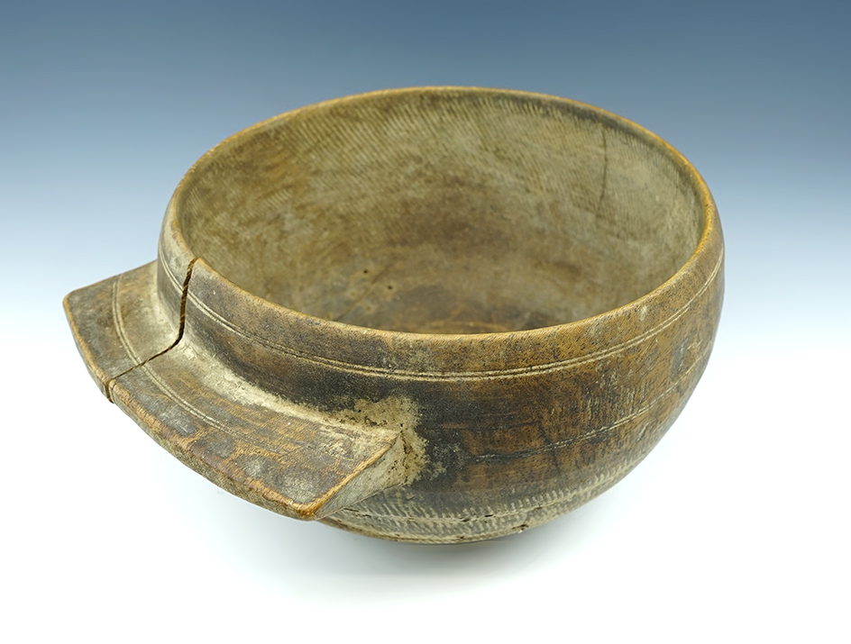 8" Diameter nicely carved and decorated wood bowl that was broken/repaired.