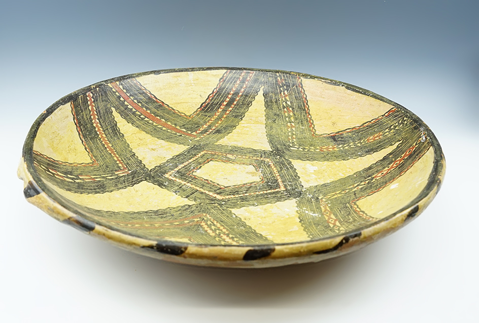 16 3/8" Berber pottery tray from Morocco. A few minor chips on the rim.
