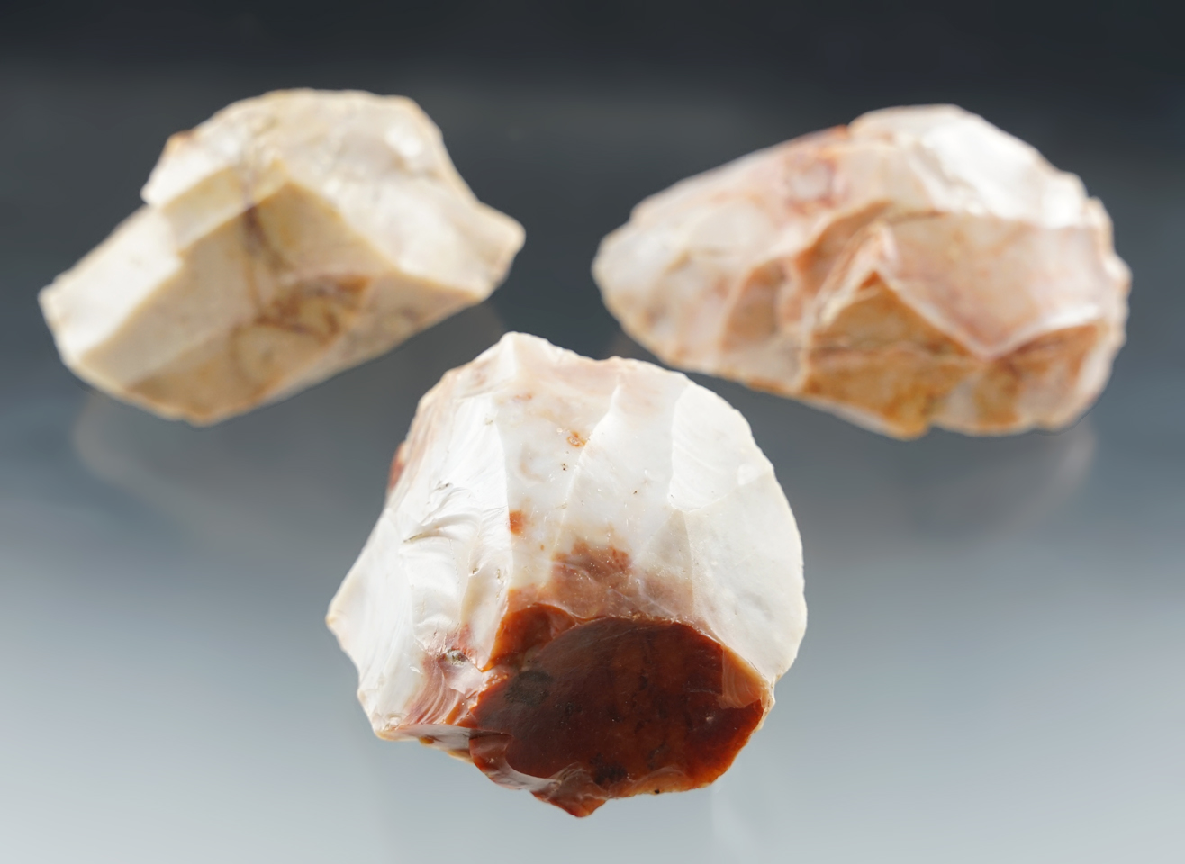 Set of three colorful Flint Ridge flint Hopewell cores found in Licking Co., Ohio. Largest is 2".