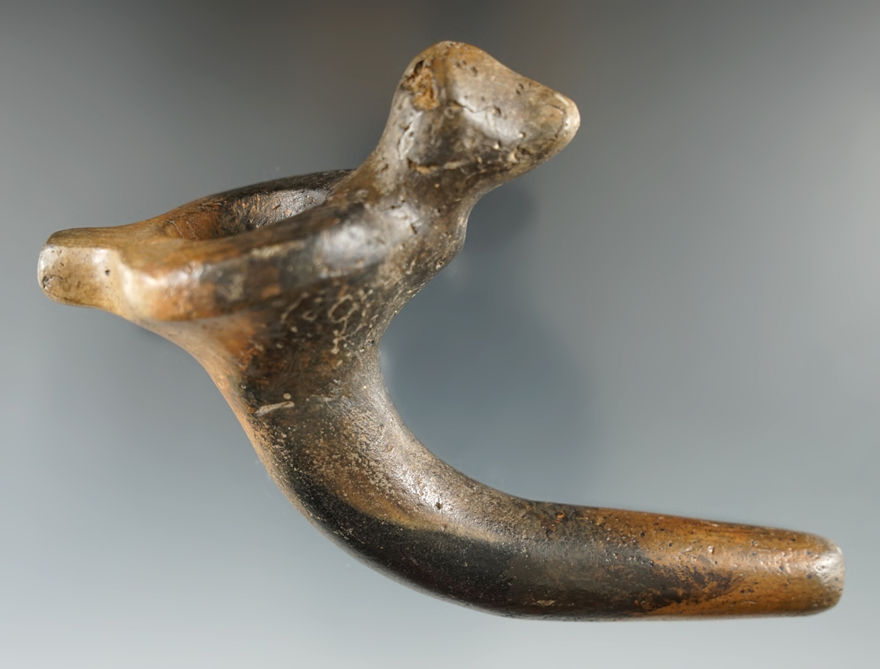 4 5/8" Iroquois clay bird effigy pipe that is broken and mended at the elbow - Ontario Canada.