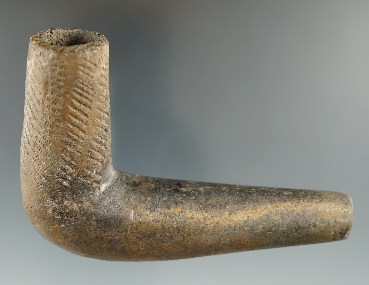 3 1/4" Owasco clay pipe - broken & mended at the elbow and some restoration at mouthpiece