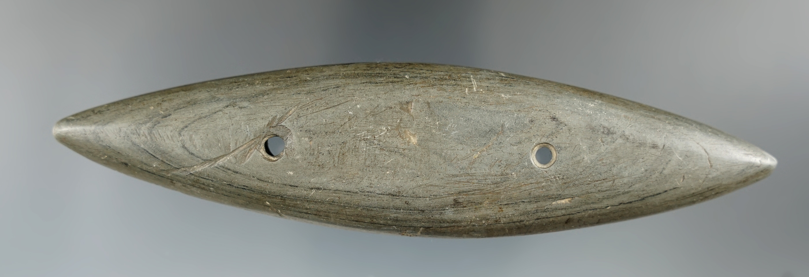 5 7/8" by pointed Gorget found in Erie Co., Pennsylvania made from nicely banded glacial slate.