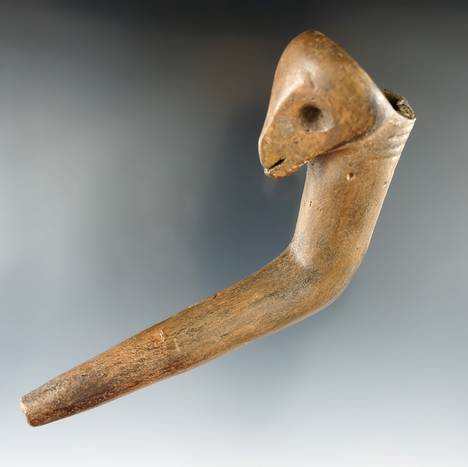 5 1/8" long bird effigy Iroquois clay pipe with restoration to part of bowl/effigy and part of stem.