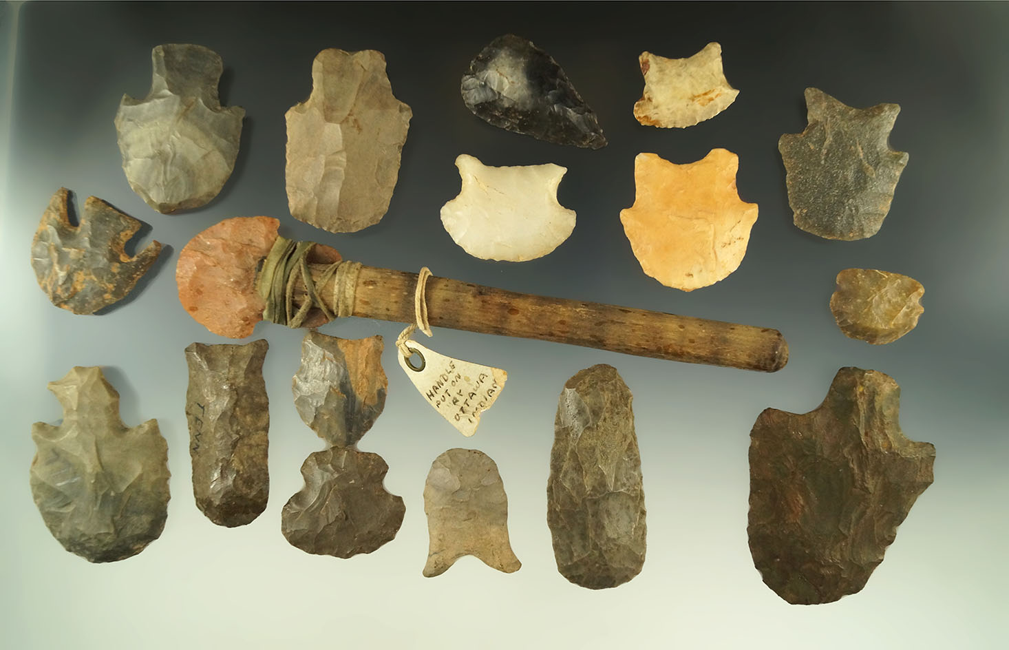 Set of 16 Midwestern hafted scrapers, and one scraper with a contemporary handle for display.