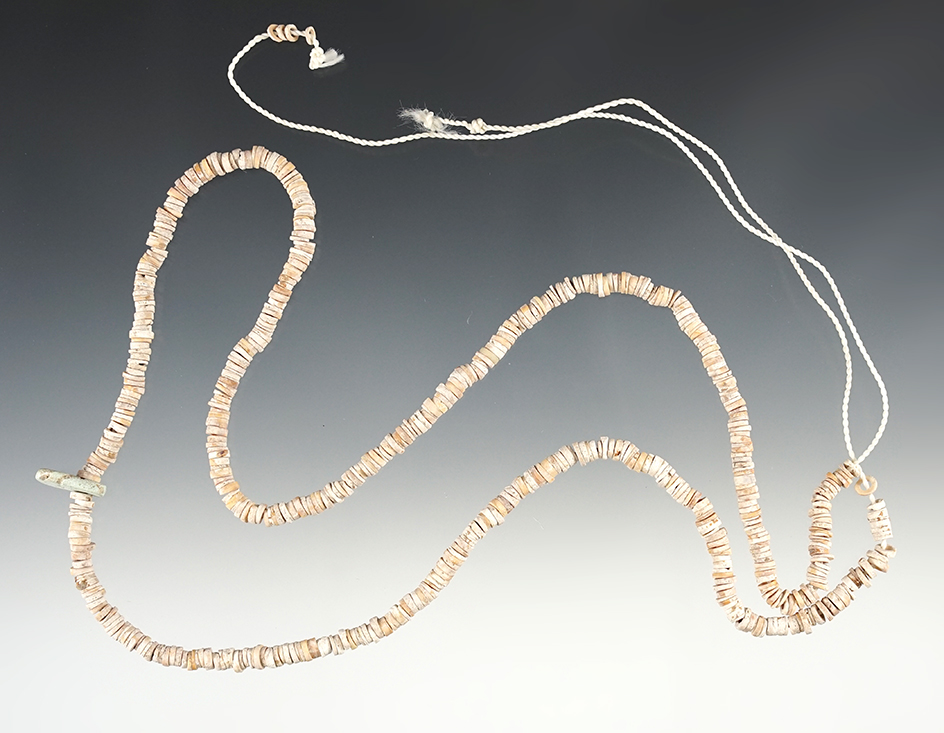 23" Strand of drilled Shell Beads including a pendant with nice color. Found in New Mexico.