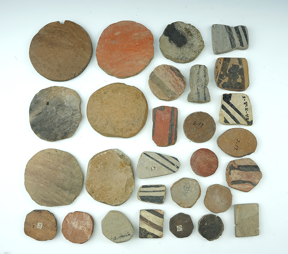 Set of 28 anciently salvaged pottery shards sanded into various shapes. All found in New Mexico.